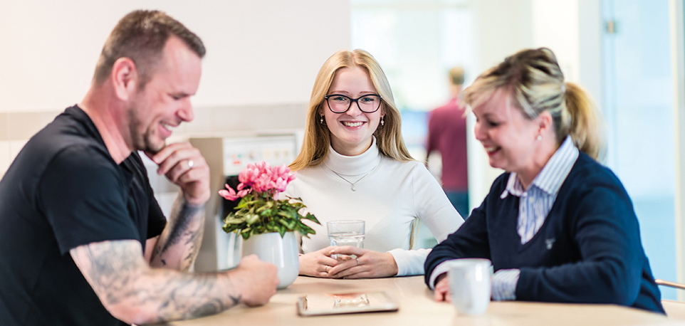 Drei Mitarbeitende der Wohn + Stadtbau Wohnungsunternehmen der Stadt Münster GmbH