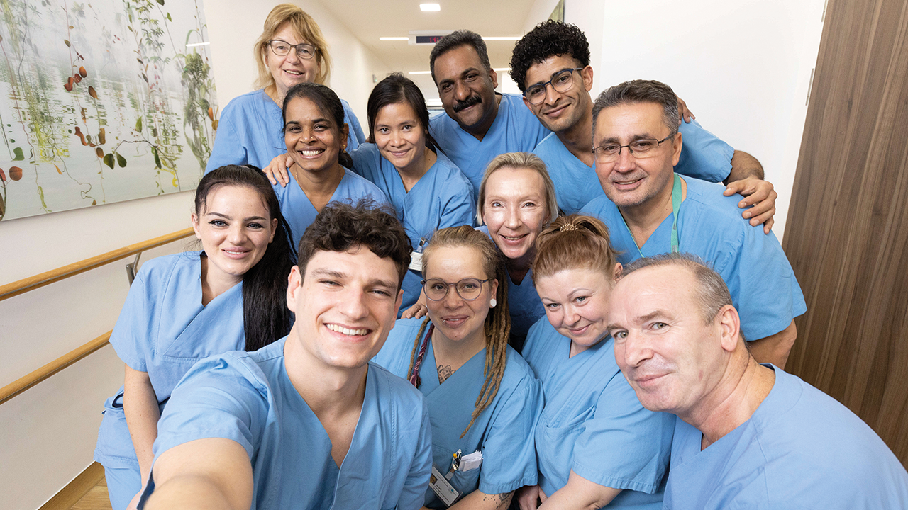 Gruppenselfie der Mitarbeitenden