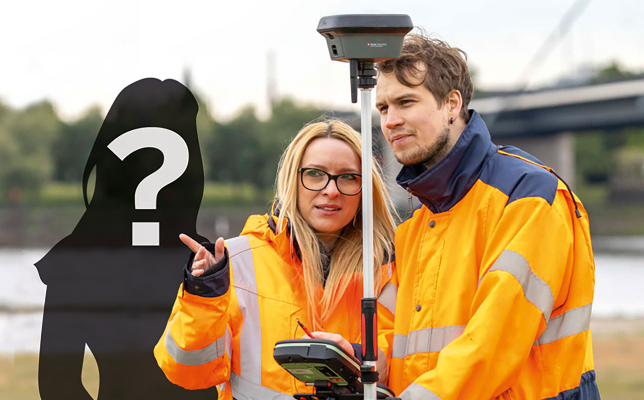 Zwei Vermesser bei der Arbeit