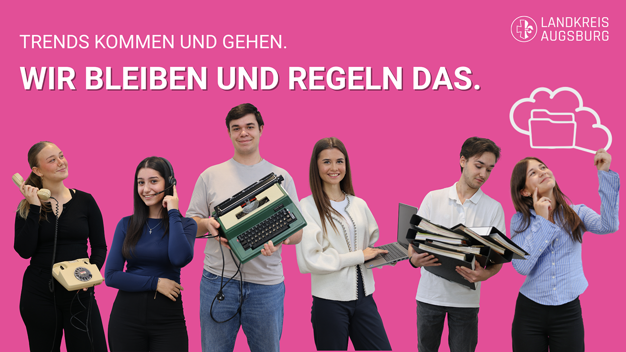 pinker Hintergrund, 6 junge Menschen stehen teilweise mit Büchern und Telefon da und schauen in die Kamera.