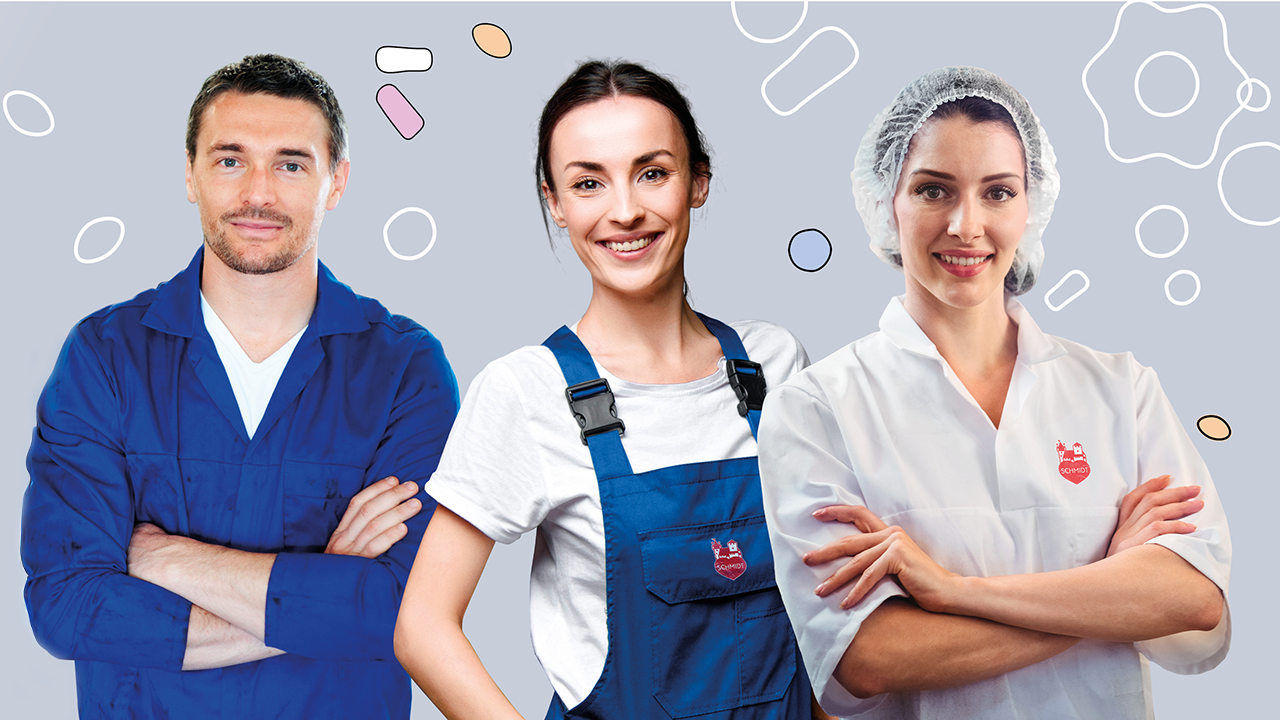 3 Mitarbeitende von Lebkuchen-Schmidt in ihrer jeweiligen Berufskleidung