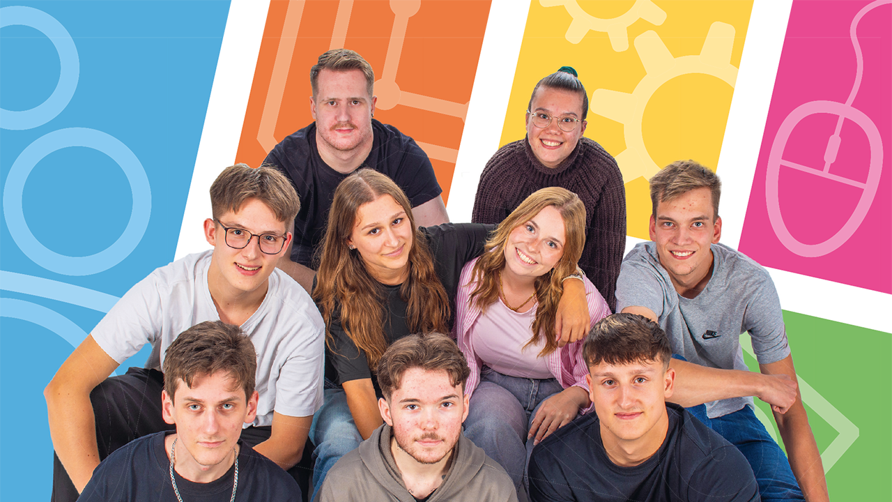 Das Bild zeigt eine Personengruppe vor buntem Hintergrund. 