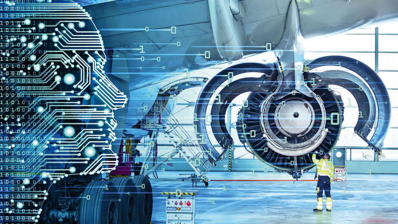 Person arbeitet an einem Triebwerk in einer Wartungshalle