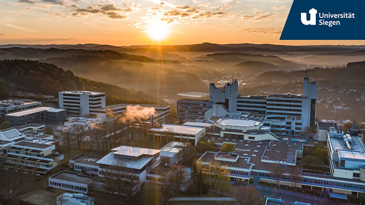 Das Bild zeigt eine Luftaufnahme der Universität Siegen, NT-Fakultät.