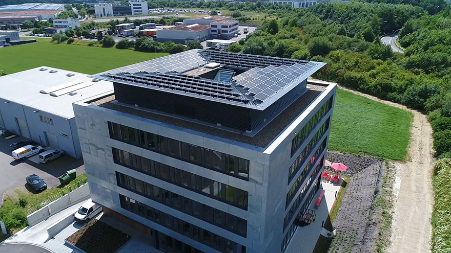 Außenaufnahme Gebäude mit Solardach-Aufbau von Goblet Lavandier & Associés Ingénieus-Conseil S.A.