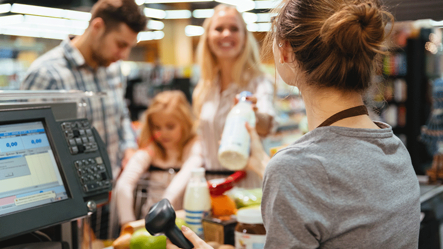 Familie an der Supermarktkasse (Symbolbild). ©drobotdean via Freepik.